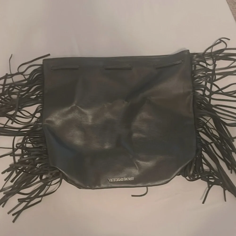Victoria secret leather with fringe on side backpack